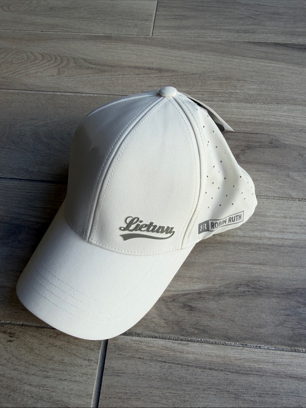 Robin Ruth White Baseball Cap with Subtle Logo